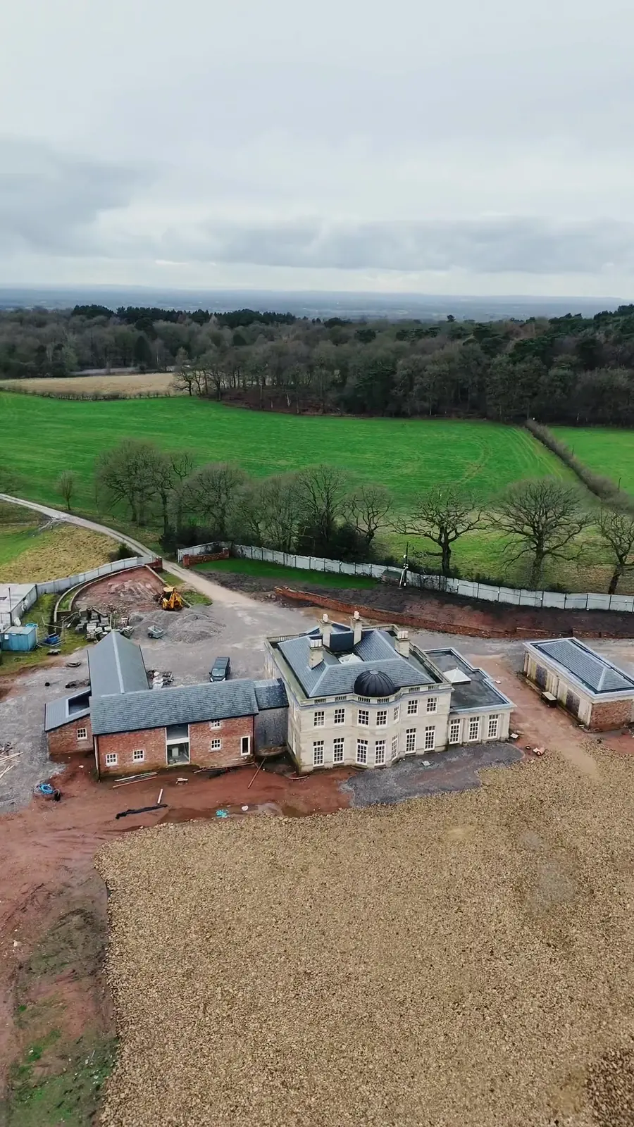 Drone view of a large house during renovation in Alderley Edge